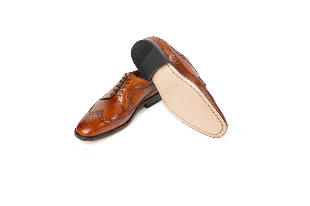 Amsterdam Cognac Patina long-wing brogue Derby leather sole view