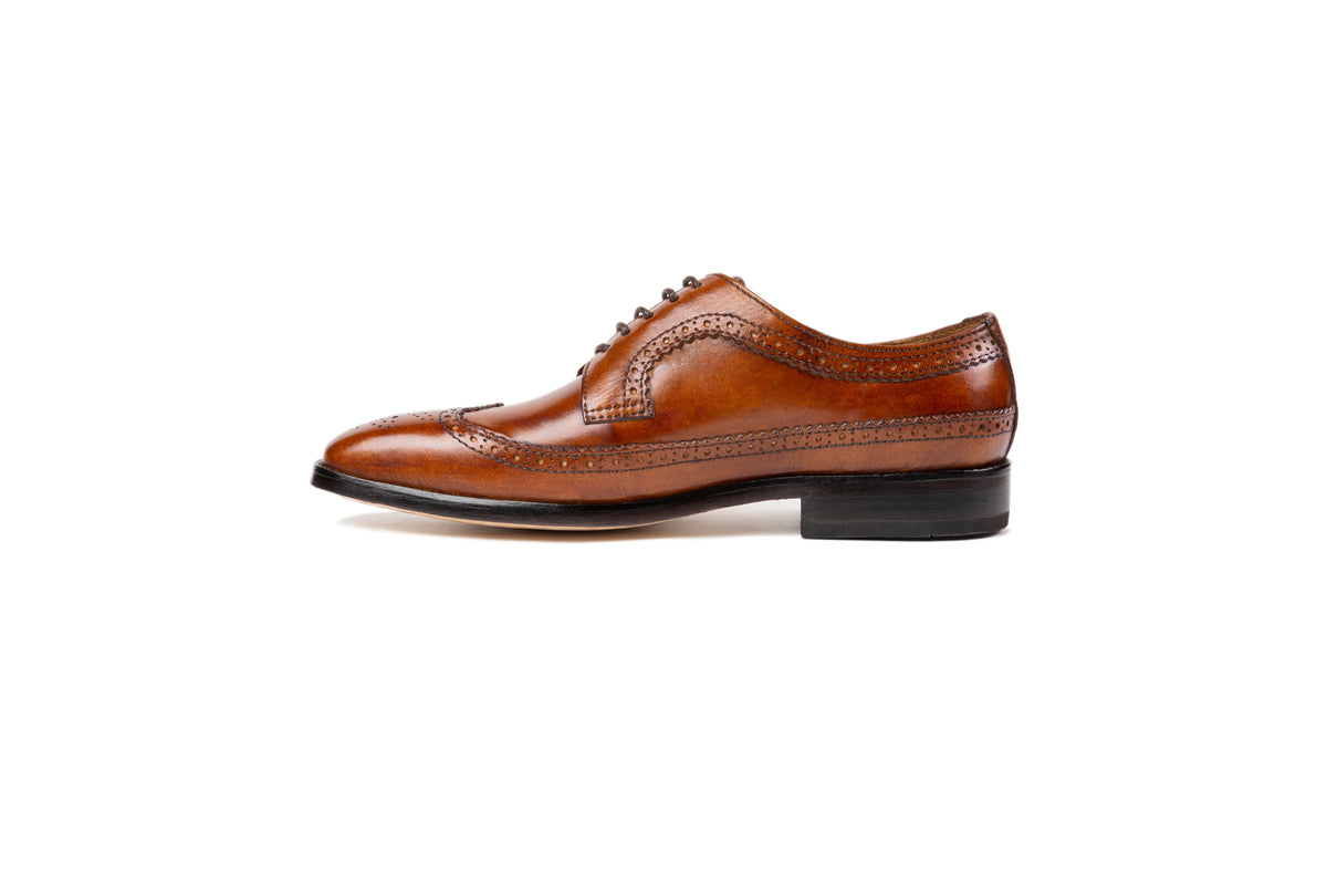 Amsterdam Cognac Patina long-wing brogue Derby opposite side profile
