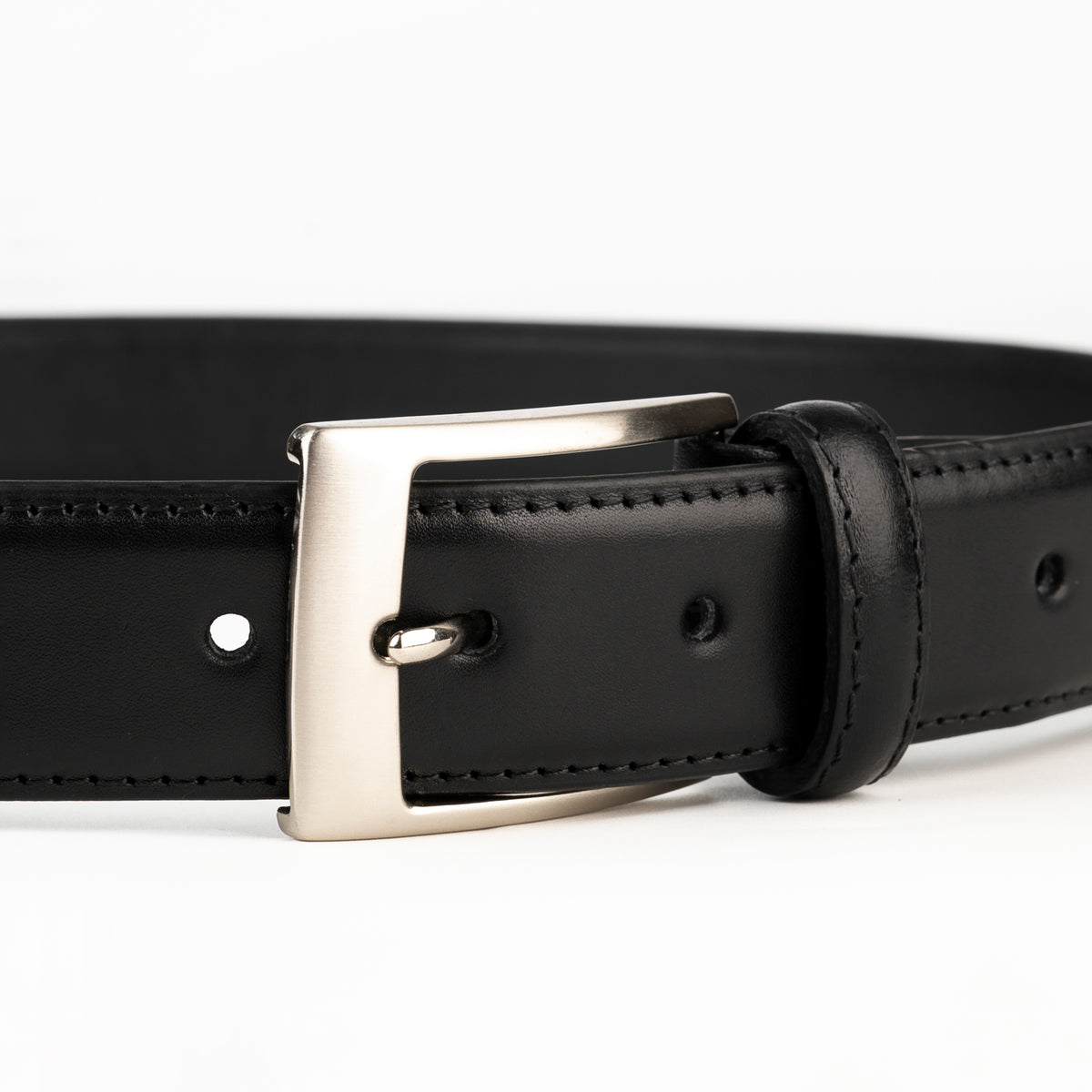 Black Avenue leather belt buckle close-up